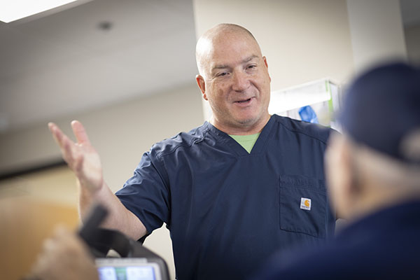 male physical therapist providing motivation to a PACE Southeast Michigan participant